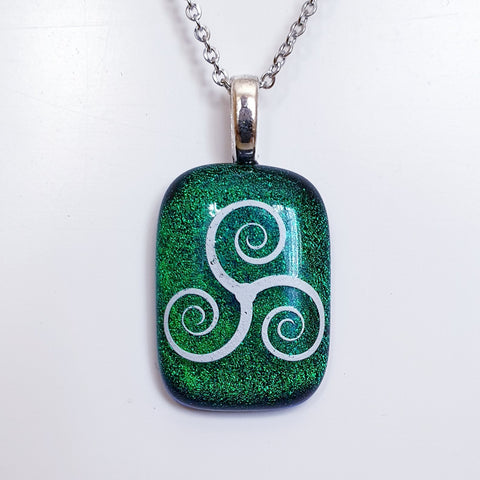 Triskele Enamel image dichroic glass pendant.