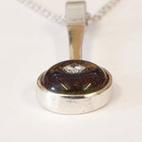 925 sterling silver surround dichroic pendant with Moissanite precious stone inset.