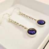 Plaited sterling silver and dichroic glass drop earrings