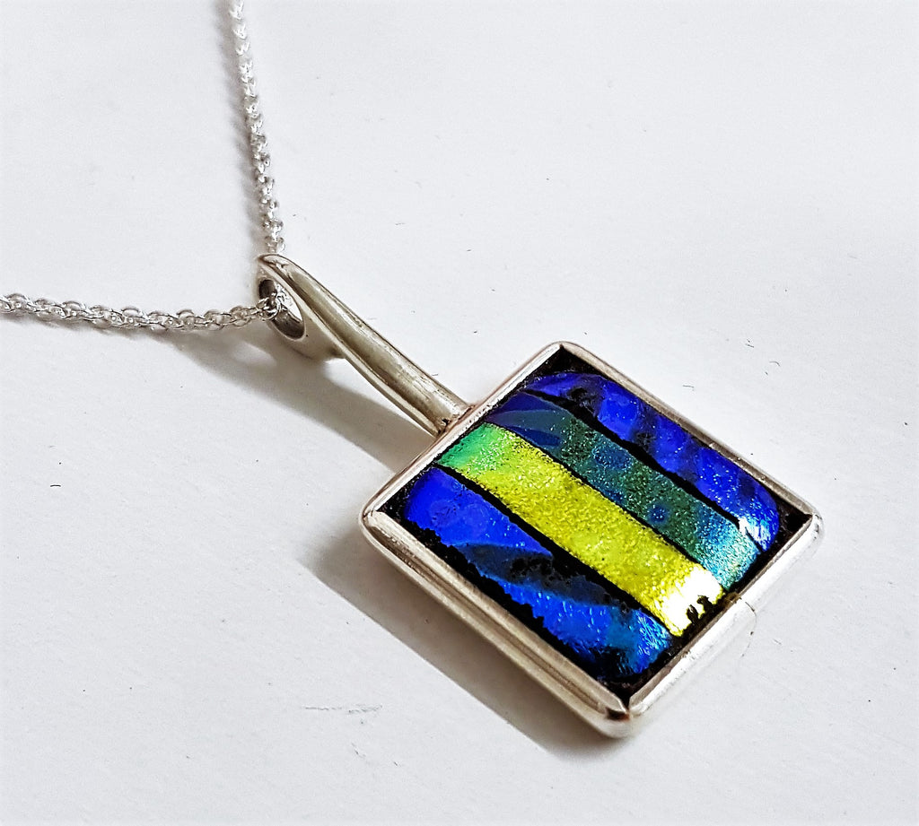 New sterling silver and dichroic design pendant.