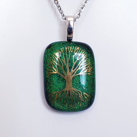 Golden tree of life enamel image glass pendant.